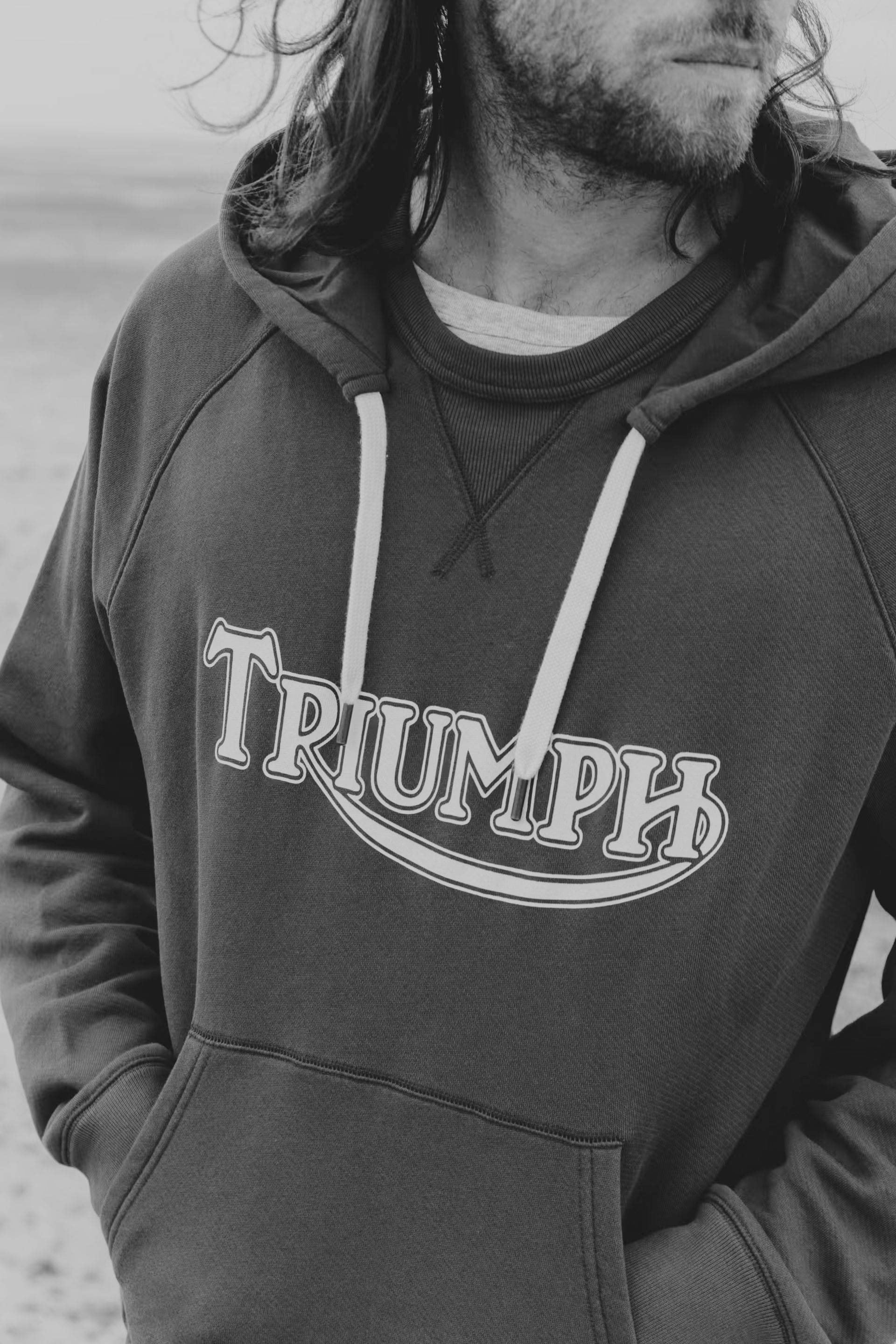 Man wearing triumph parka overhead hoodie